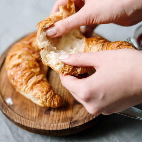 wooden bowl with croissant
